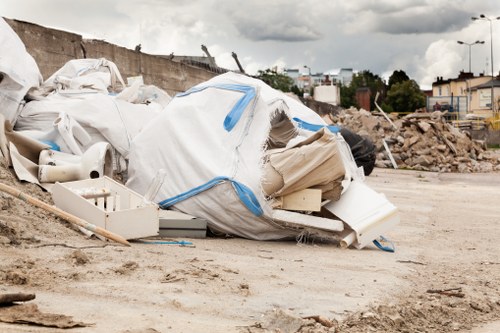 Safety inspection being carried out on a skip and vehicle