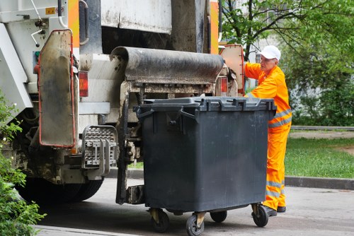 Workers sorting construction debris